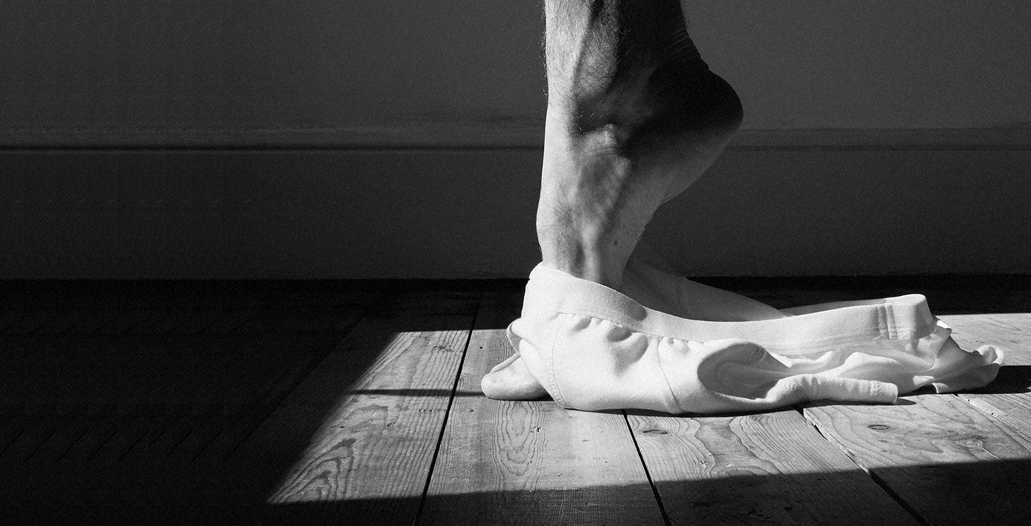 One Essentials Male White Boxer Briefs On The Floor